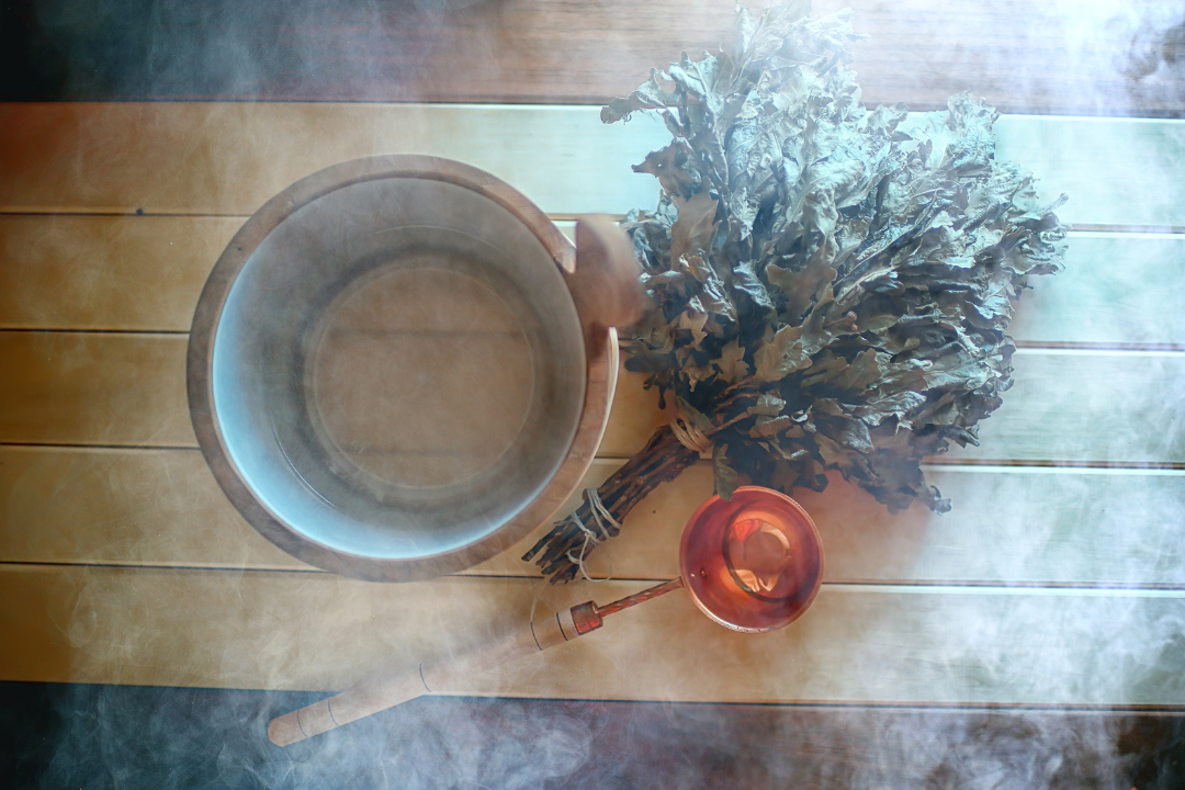 Sauna with a bucket and a birch whisk