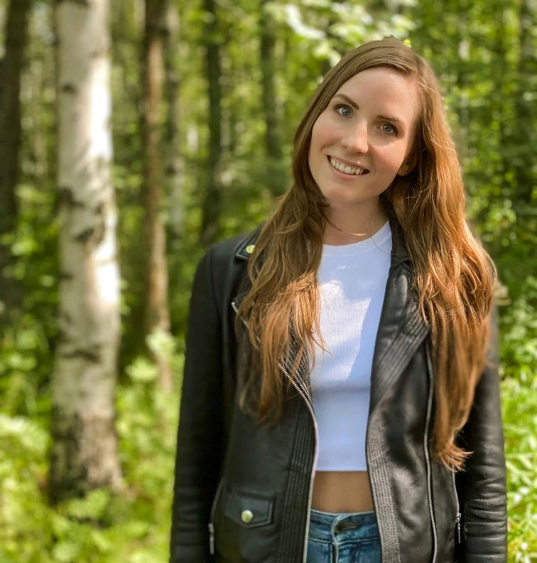 Woman smiling in a forest