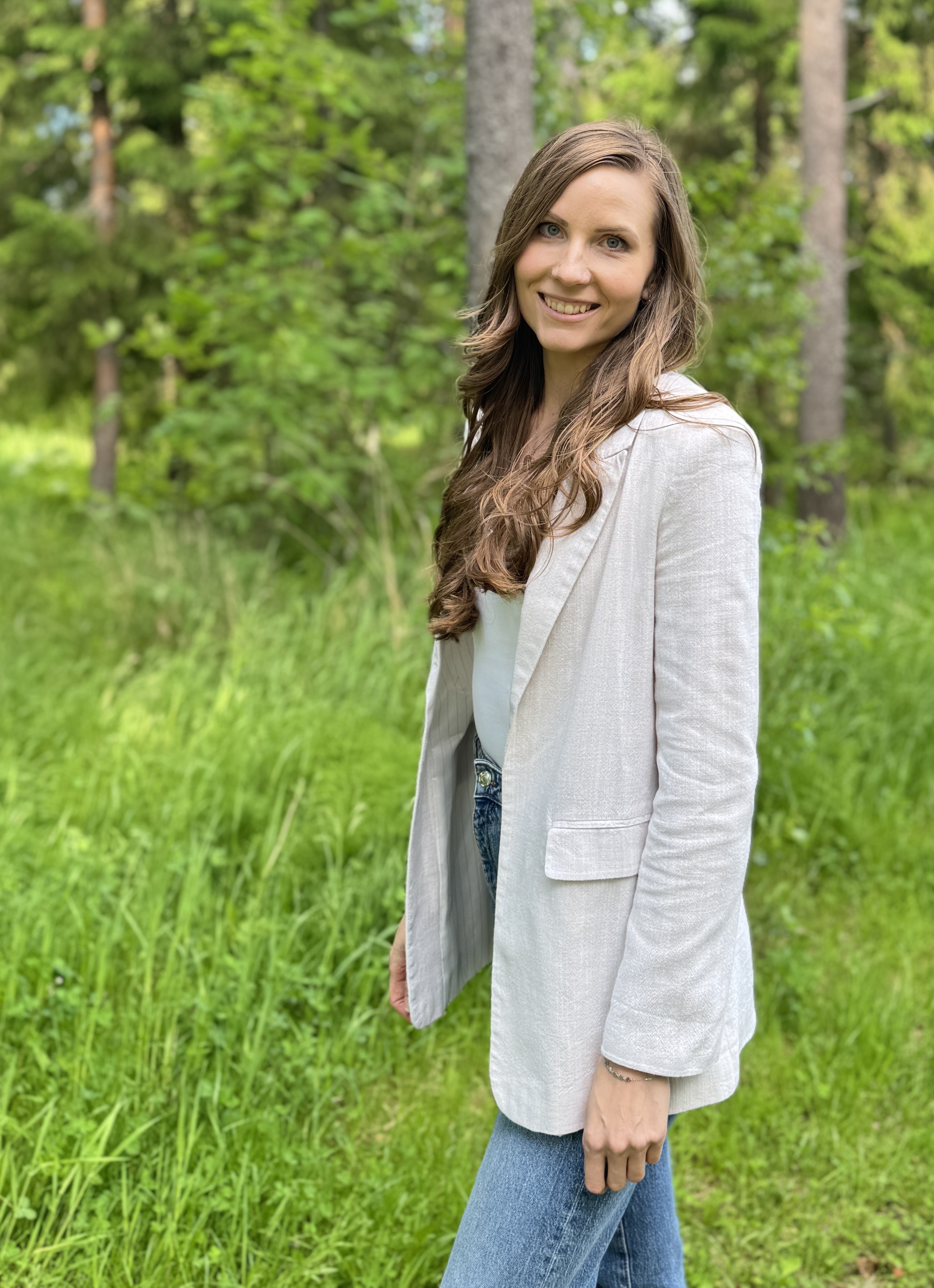 Woman smiling in a forest