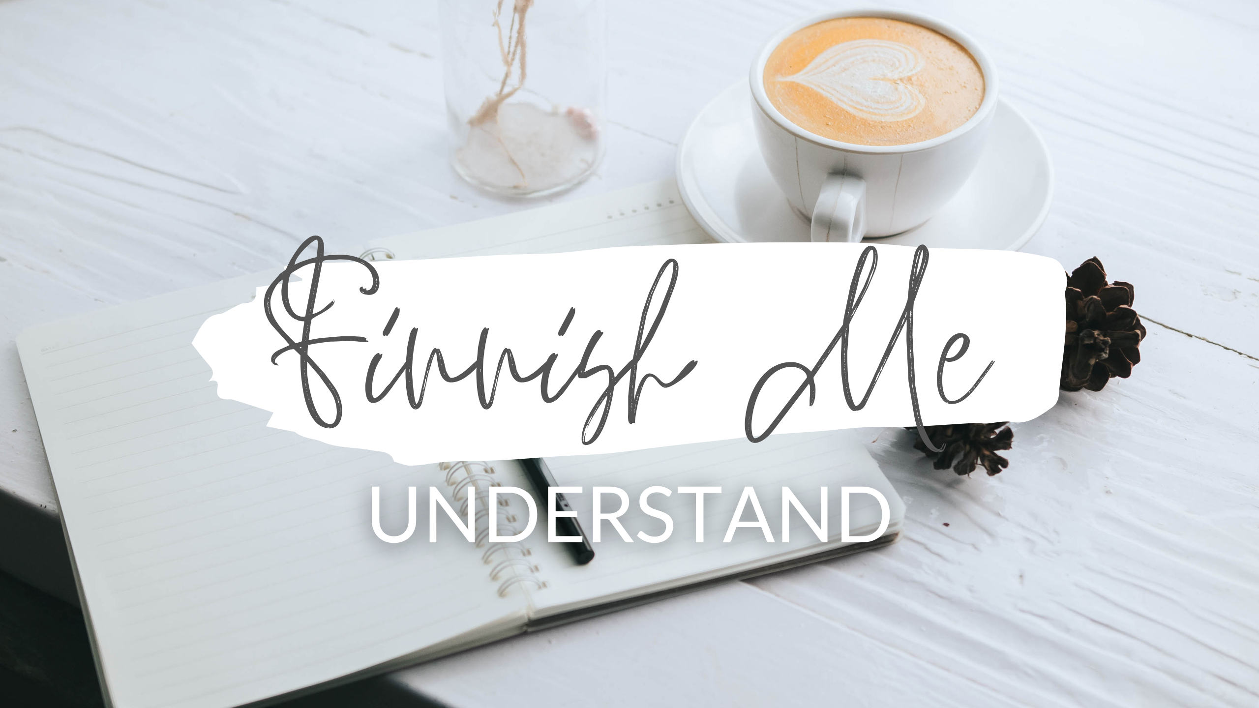 A notebook and coffee with a text Finnish Me