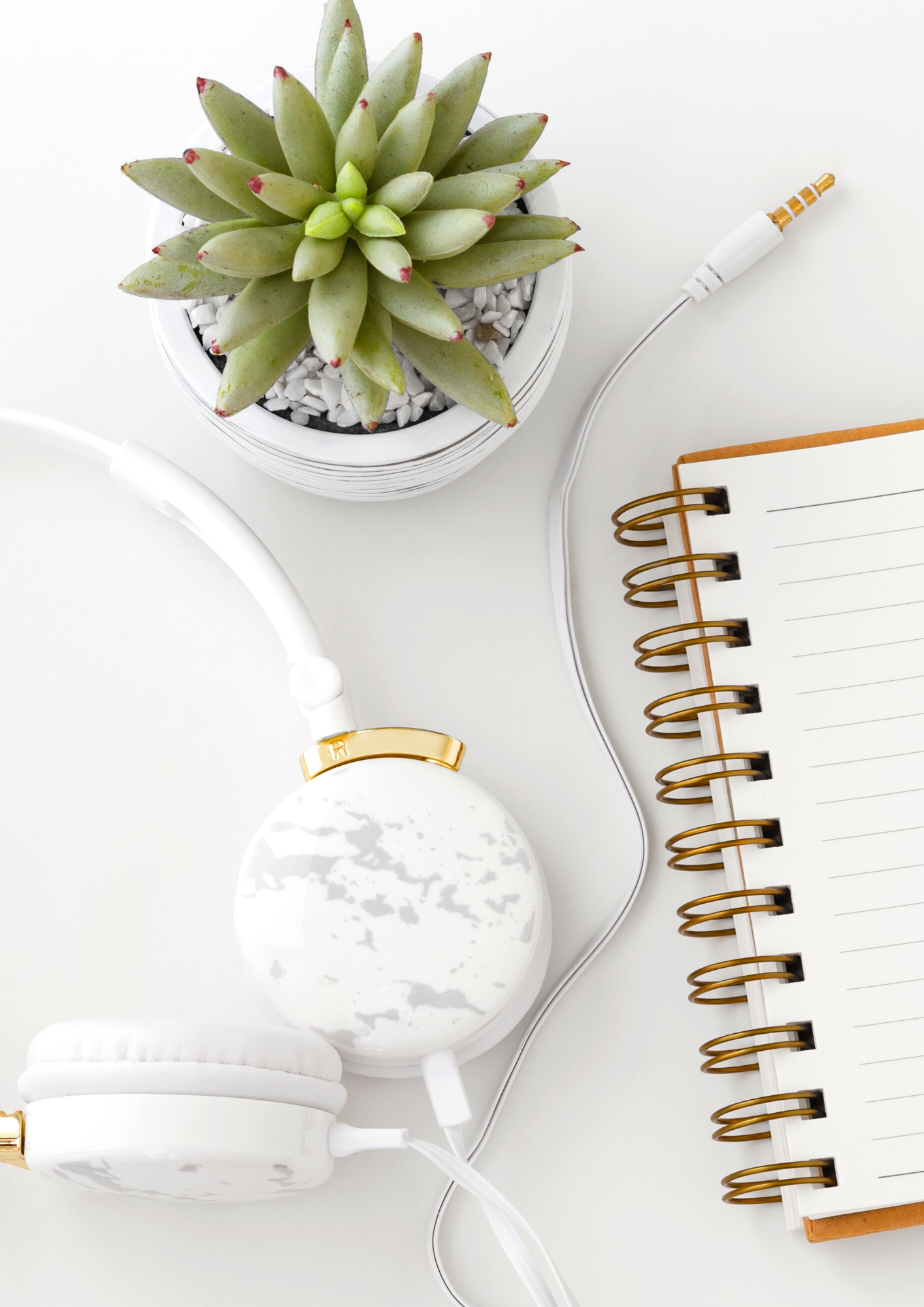 Headphones and a notebook