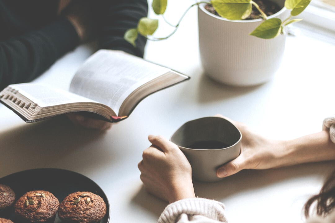 A couple having coffee and reading